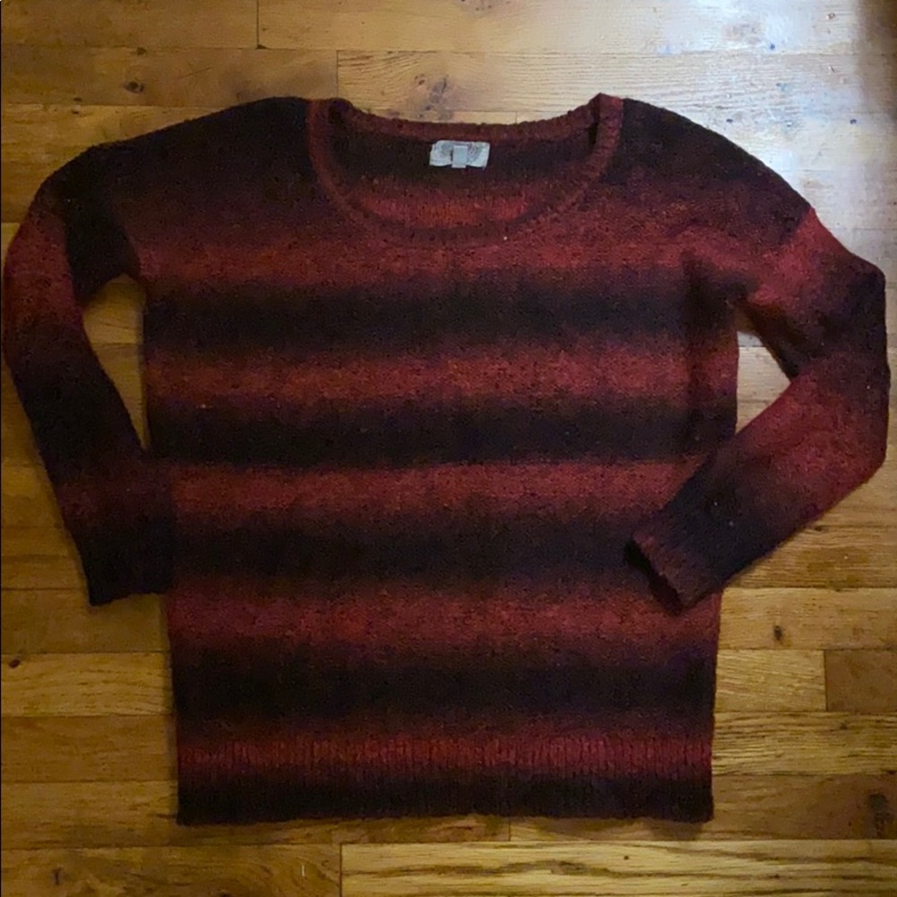 Red and black faded sweater